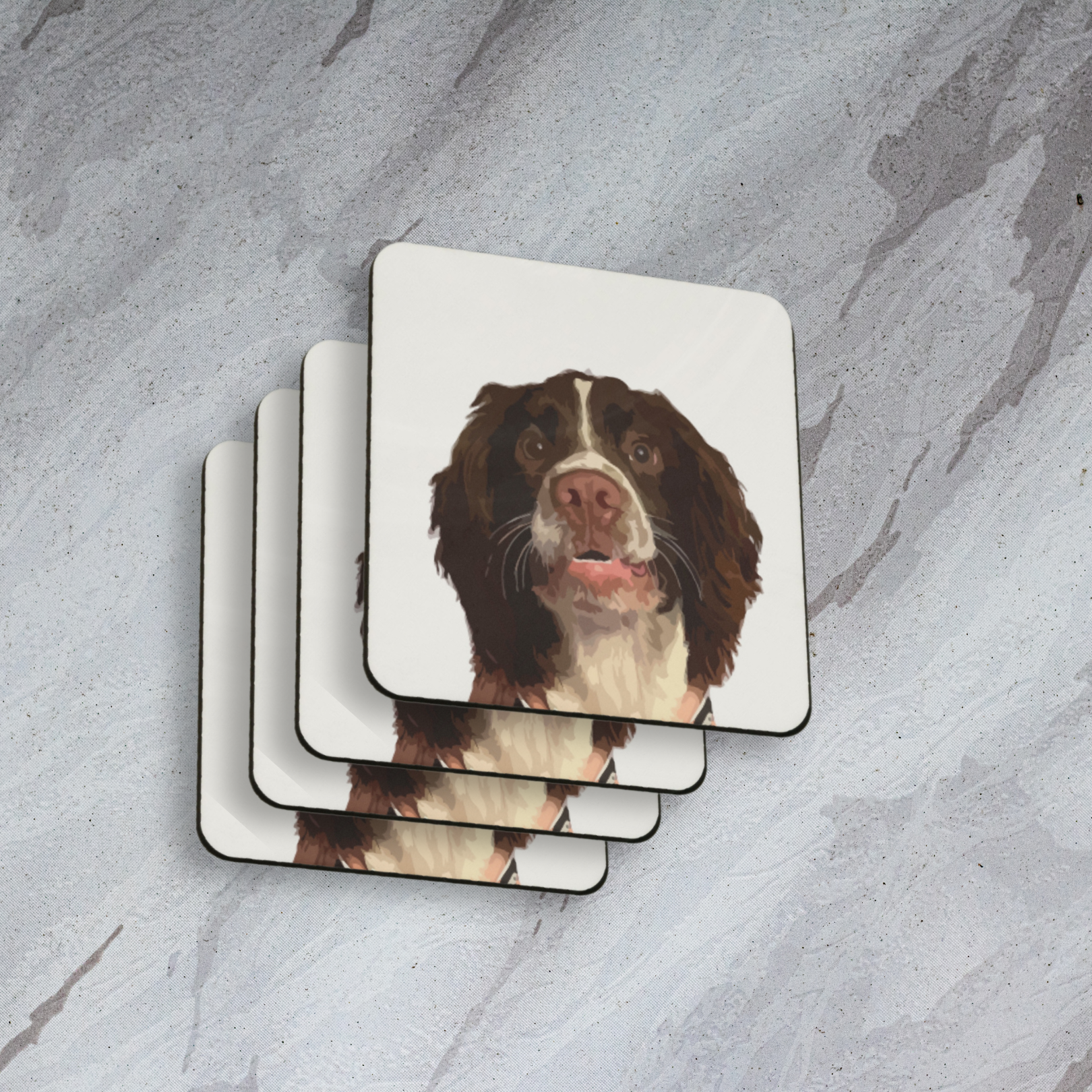 Product shot of four minimalistic coasters featuring a English spaniel from Fanaticelle