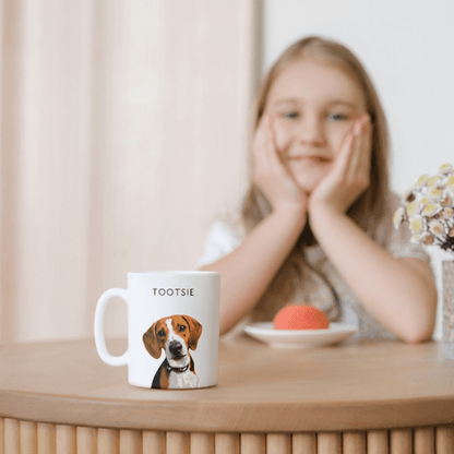 Photo of the pet portrait vector style mug with a child looking fondly at at from the background