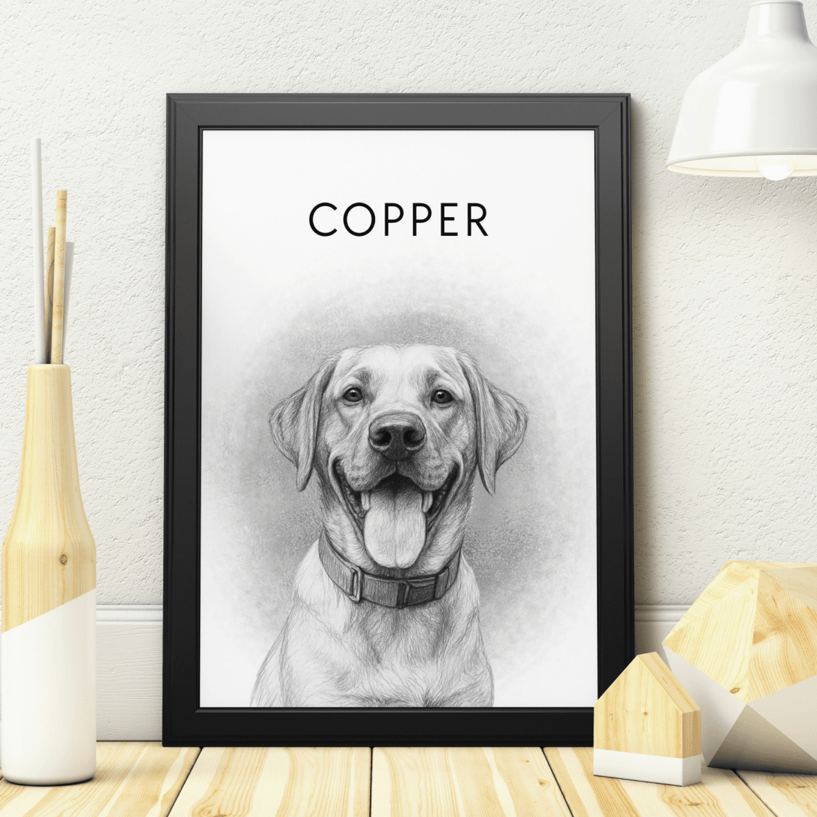Image of a framed pencil style sketched pet portrait featuring a dog called Copper
